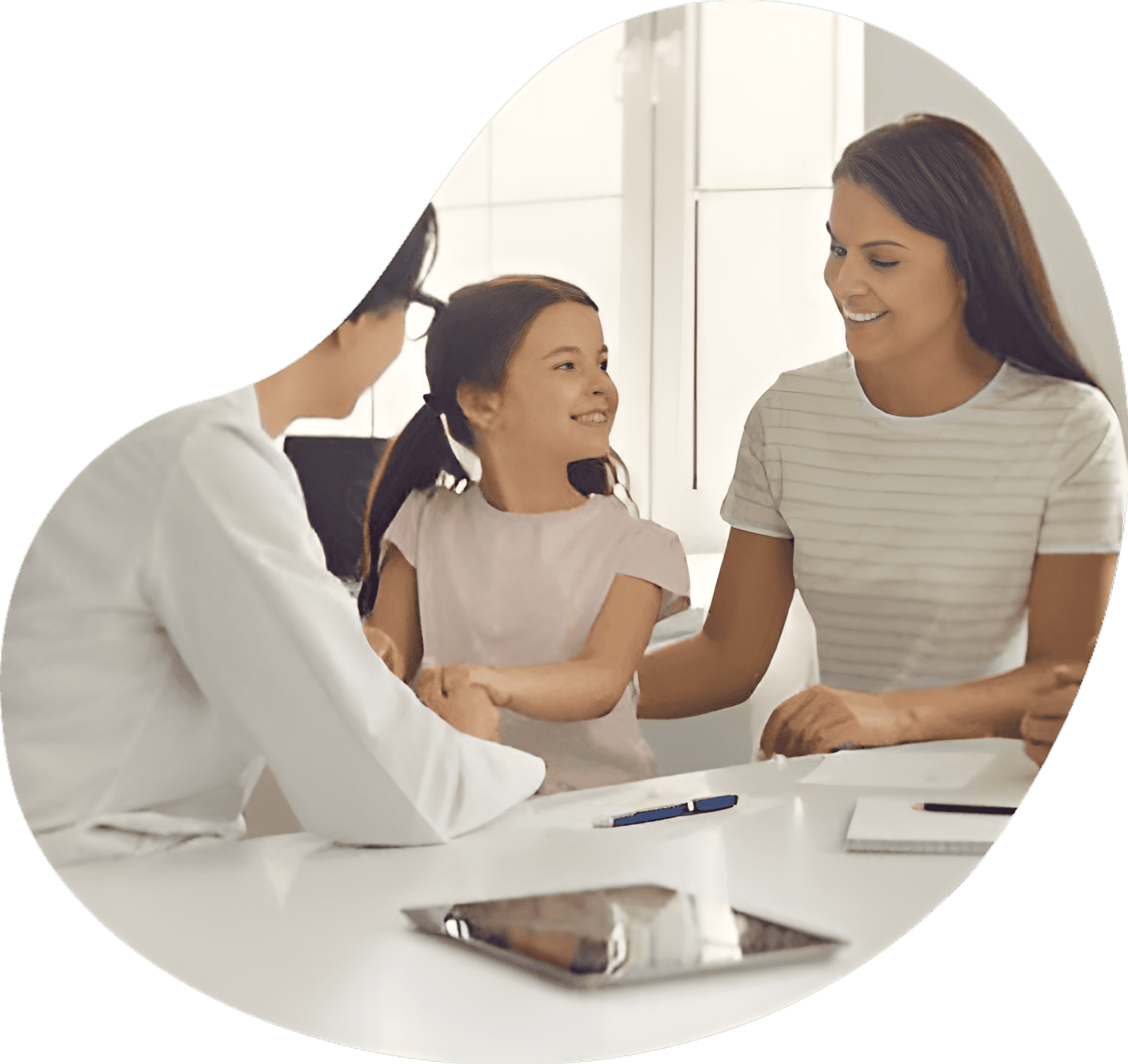 A mother and her child are engaged in distance learning at home in front of the computer